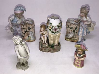 null Lot including:

- Five biscuit or porcelain subjects, modern

- White earthenware...