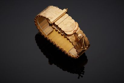  BRACELET « manchette ceinture » en or rose et or jaune (750‰) finement ciselé à...