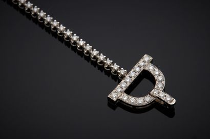 null BRACELET en or gris (750‰) serti d’un alignement de diamants taille brillant....