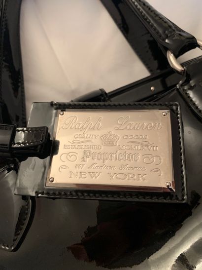 null 
RALPH LAUREN




Black patent leather handbag, engraved metal identification...