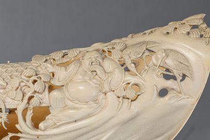 null Important carved ivory tusk representing a frieze of characters

Large openwork...