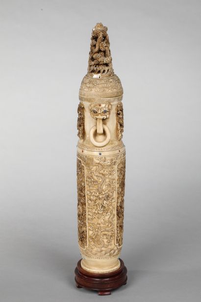 null Covered vase of baluster form and two handles.

Carved ivory with large dragon...
