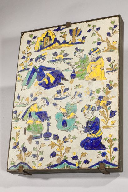 null 
Safavid style tile
Ceramic with polychrome decoration in cuerda seca
Iran,...