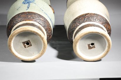 null Two baluster-shaped vases in cracked porcelain with blue decoration of warriors...
