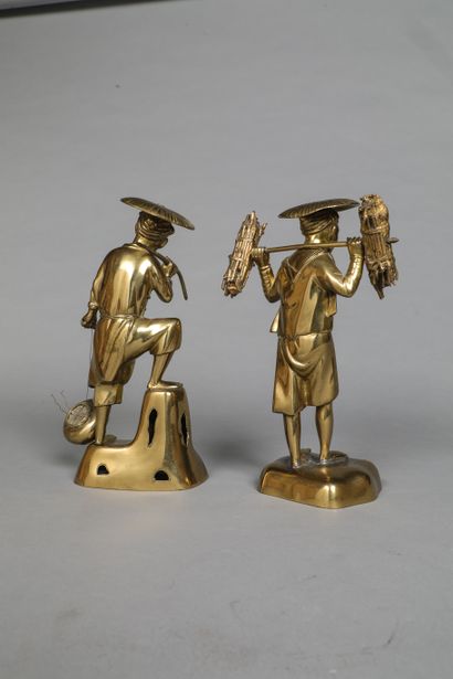 null Meeting of 4 sculptures in patinated and gilded metal representing a peasant...