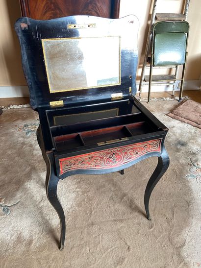 null Dressing table in blackened wood and marquetry known as "Boulle" of brass and...