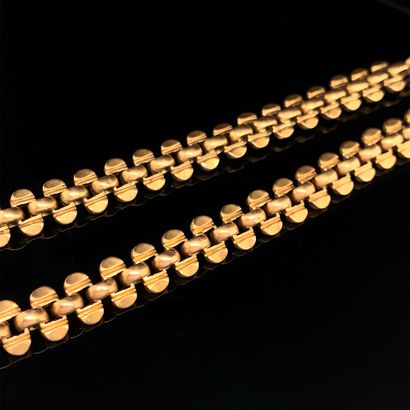 null Pink gold (750‰) GILETIERE CHAIN with geometric links. Shock.

French work,...