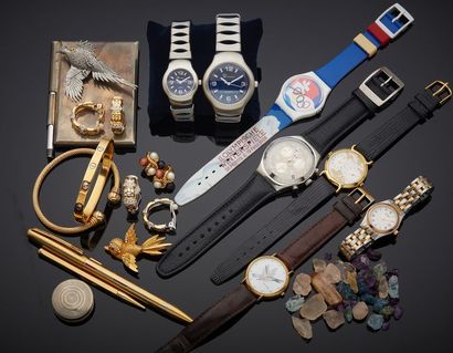 null LOT of metal JEWELRY comprising: seven quartz WATCHES, two "bird" PINS, three...