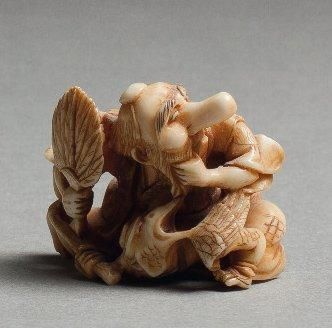 null NETSUKE en ivoire représentant un acteur du théâtre Nô portant un masque de...