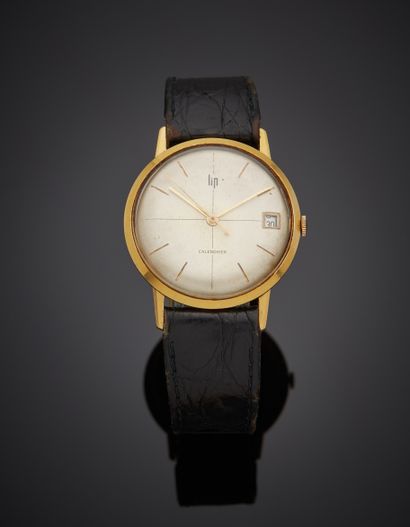 null LIP 
BRACELET MONTRE round in yellow gold (750‰), "Calendar" model. Cream dial,...