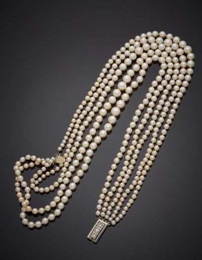 null "Drapery" NECKLACE composed of five rows of falling cultured pearls. Rectangular...