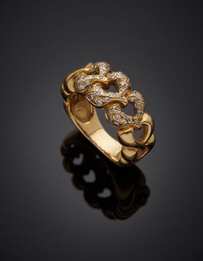 null BAGUE " sept cœurs " en or jaune (750‰) partiellement ciselé et serti de diamants...