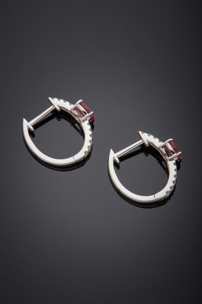 null Pair of "fine creole" EARRINGS in white gold (750‰) set with an oval-shaped...