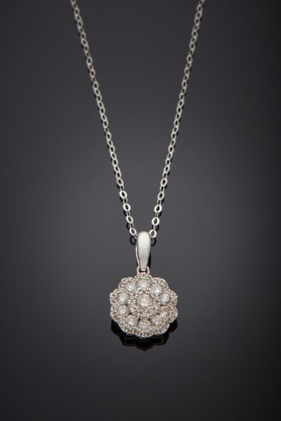 null White gold (750‰) "flower" pendant and chain set with brilliant-cut diamonds....