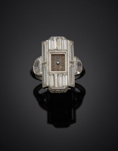 null Geometric watch ring in platinum (950‰). Bezel set with baguette-cut, calibrated...