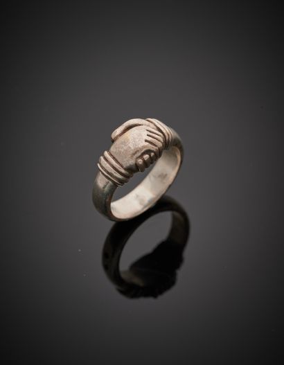 null Silver "friendship" ring (min. 800‰) gadrooned, featuring a "handshake". French...