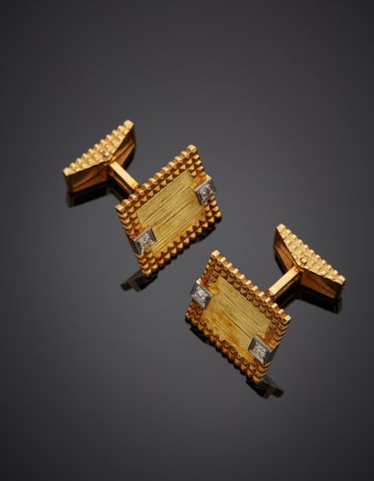 Pair of square yellow and white gold (750‰)...