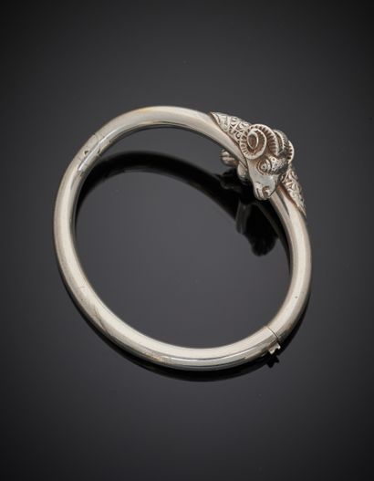 null Silver (800‰) tubular rigid opening "rams" BRACELET. The heads carved and chiseled....