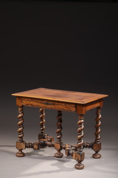 Table en bois naturel et montants en bois...
