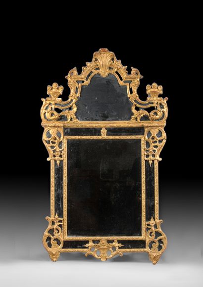Carved and gilded wood window with scrolling...