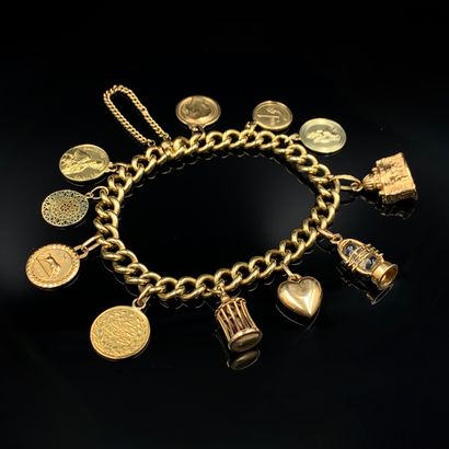 BRACELET in yellow gold (750‰) with gourmette...