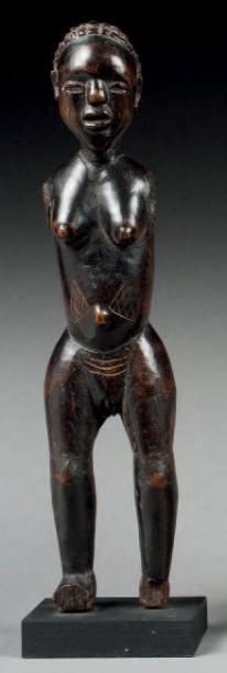 null STATUETTE ANTHROPOMORPHE FÉMININE présentant une jeune femme au ventre et joues...