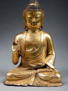 null BOUDDHA assis en position d'argumentation, Bronze doré. Tibet. 30cm