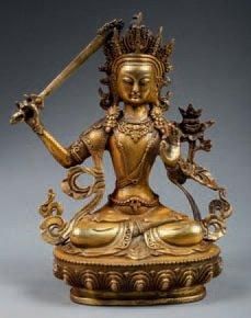 null BODHISATTVA brandissant l'épée de justice. Bronze doré. Tibet. 21cm