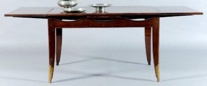 Eugène PRINTZ (1889-1948) Table de salle à manger «portefeuille» en placage de palissandre....
