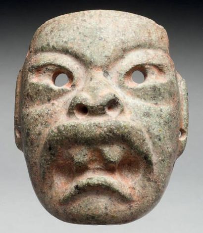 null Petit masque cultuel présentant le visage probablement d'un chef shaman en état...