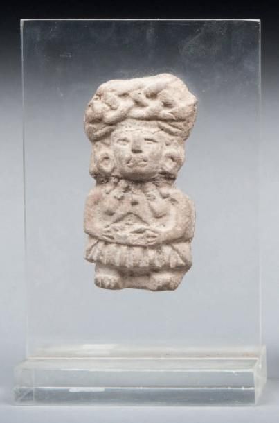 null Figurine modelée d'une déesse de la terre. Terre cuite brune et beige, (cou...