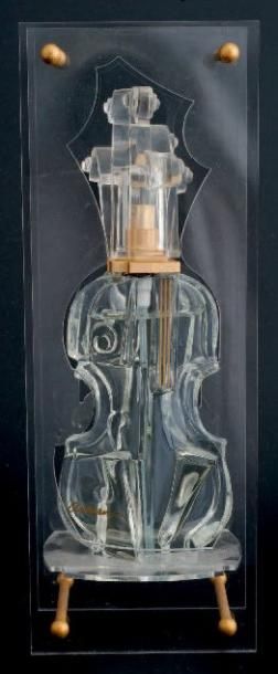 ARMAN Flacon vaporisateur en verre d'après le maitre sculpteur Arman. Flacon figurant...