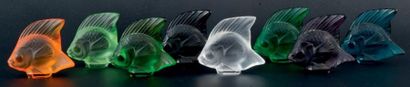 LALIQUE FRANCE COLLECTION «BESTIAIRE» Lot comprenant 8 poissons en cristal teinté....