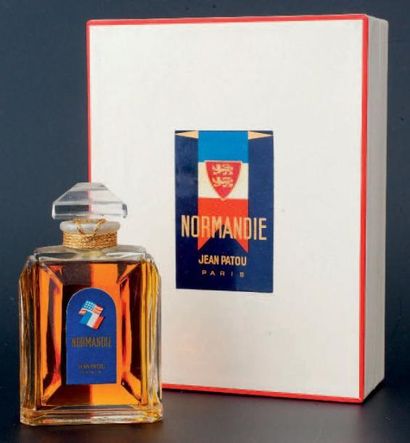 Jean Patou «NORMANDIE» Flacon en verre, panse à découpe, titré sous la base. Etiquette...