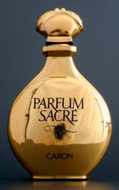 Caron «PARFUM SACRÉ» Flacon en verre recouvert couleur or, réédition du flacon pour...