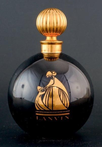 LANVIN «ARPÈGE» Flacon en verre opaque, modèle boule noire. Siglé couleur or de Madame...