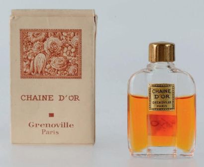 Grenoville «EXTRAIT CHAINE D'OR» Flacon miniature en verre, décor perlé. Bouchon...