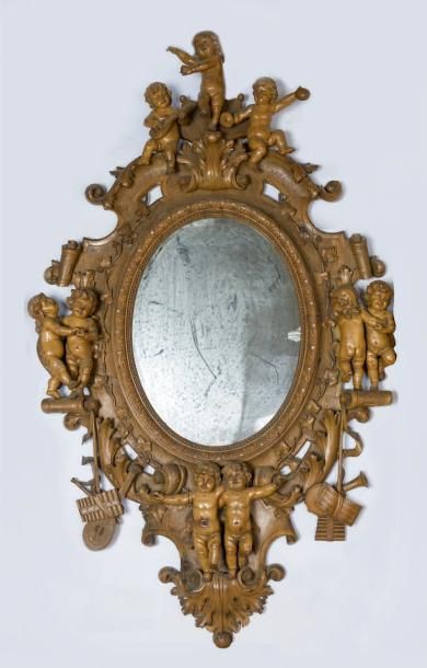 null ALLÉGORIE DE LA MUSIQUE Exceptionnel miroir en buis à décor richement sculpté...