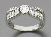 null BAGUE en or gris (750 millièmes) serti d'un diamant taille brillant épaulé d'un...