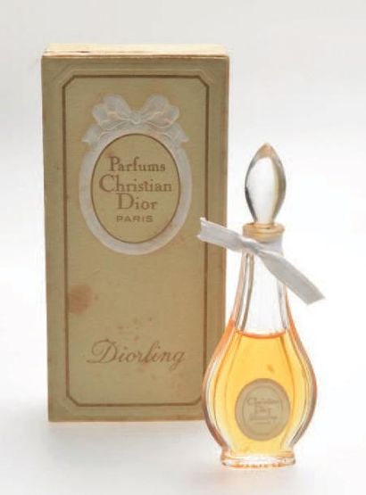 CHRISTIAN DIOR «DIORLING» Rare flacon de sac en verre, étiquette titrée. Bouchon...