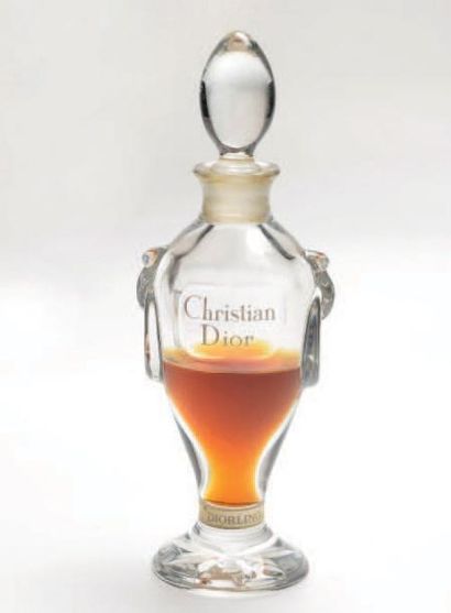 CHRISTIAN DIOR " DIORLING" Flacon en cristal, panse de forme amphore. Scellé. Siglé...