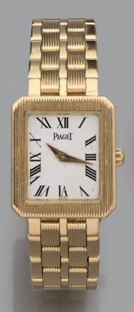 PIAGET BRACELET MONTRE de dame rectangulaire en or jaune (750 millièmes). Cadran...