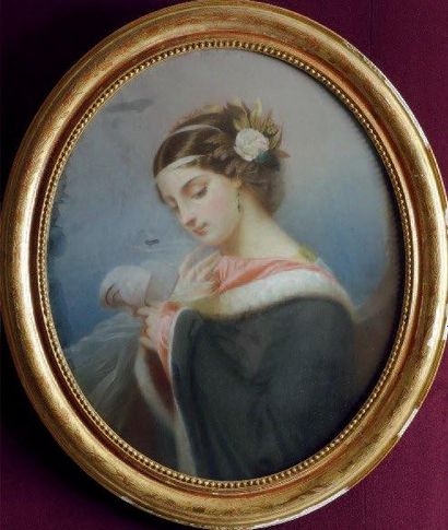 ECOLE ÉTRANGÈRE DU XIXÈME SIÈCLE Jeune femme lisant une lettre Pastel à vue ovale...