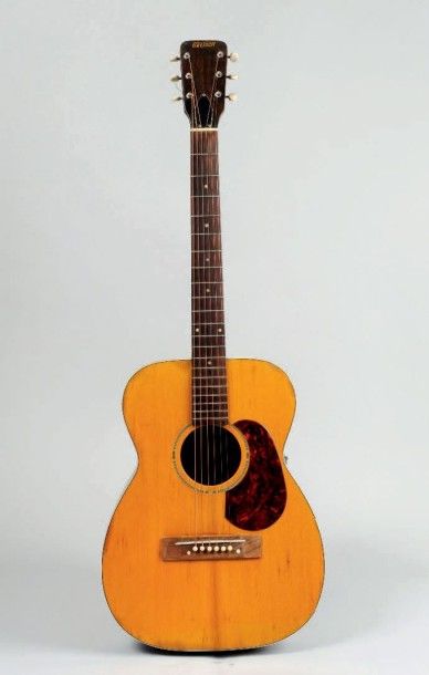 null Guitare folk de marque GRETSCH modèle
Jimmie ROGERS de 1959 n° de série 29 811
Caisse...