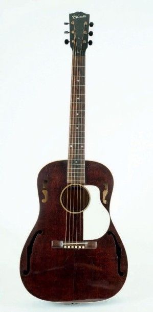 null Guitare flat-top acoustique de marque GIBSON modèle HG-20 n° 318 de 1932
Finition...