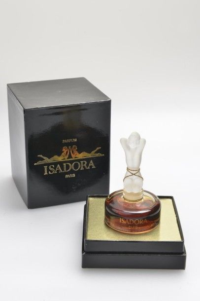 ISADORA Flacon en verre, de forme cylindrique. Bouchon figurine, représentant une...