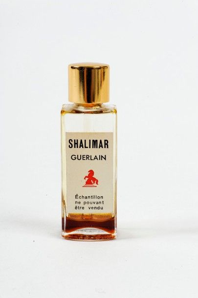 Guerlain "Shalimar" Testeur touche-oreille bouchon doré, étiquette titrée et décorée...