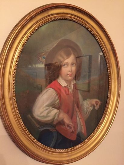 LUCIE R (XIXème siècle) 
Portait d'enfant au gilet rouge
Pastel de forme ovale signé...