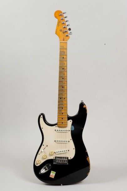 null Guitare Solidbody de marque Fender modèle Stratocaster lefty n° de série E933145...