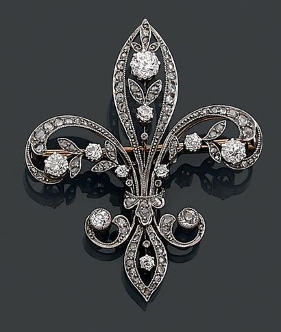 null BROCHE «fleur de lys» en or jaune (750 millièmes) et argent (min. 800 millièmes)...